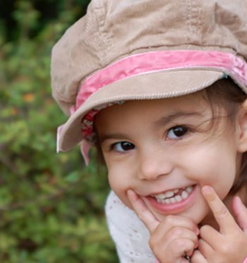 Little girl with big hat